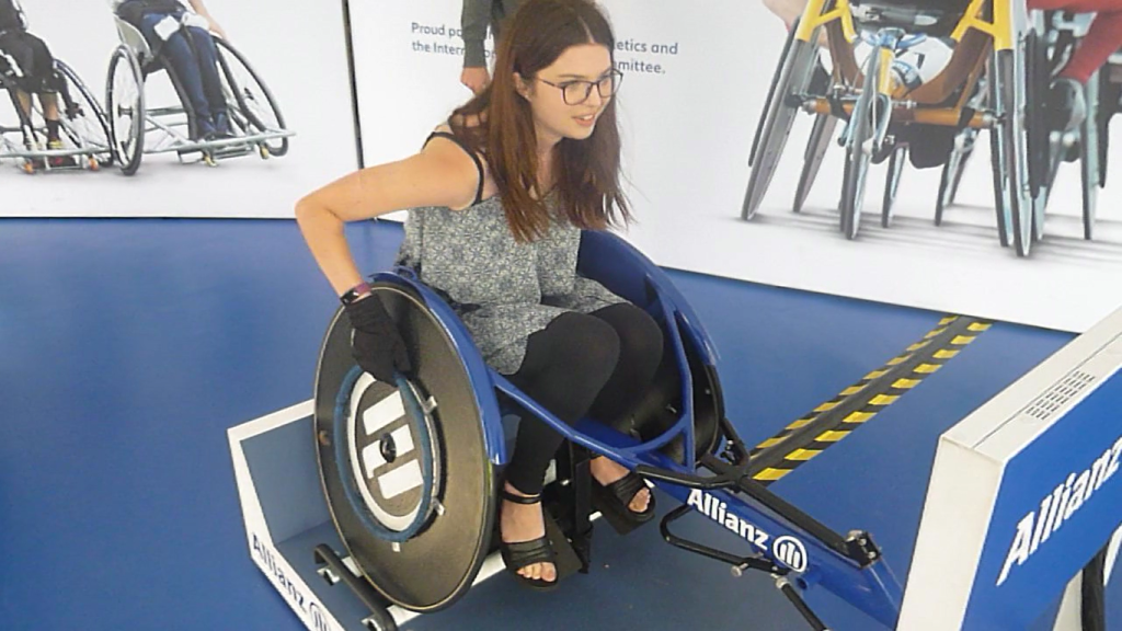 Jenni in a sports wheelchair racing