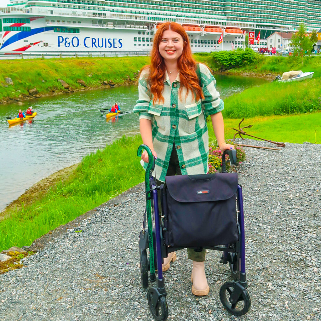 Jenni walking with her rollator. A P&O Cruiseline is in the background.